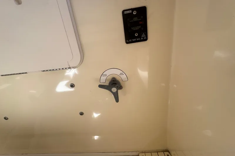 Slide: The Image of Control panel and valve on 2008 Scout 282 Sportfish boat interior. - 34