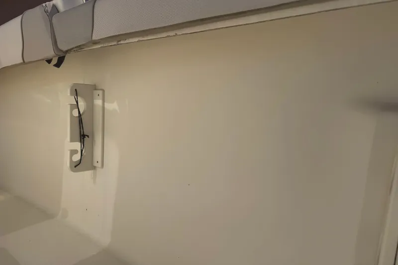 Slide: The Image of 2008 Scout 282 Sportfish interior detail with mounted accessory holder. - 26