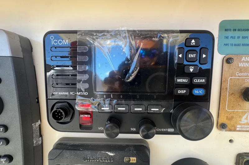Slide: The Image of Icom VHF Marine IC-M510 radio on 2008 Scout 282 Sportfish boat dashboard. - 37