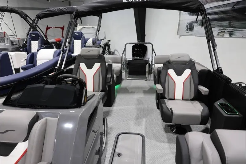 Slide: The Image of Interior of 2026 Evotti 721QL boat with modern seating and sleek design. - 6