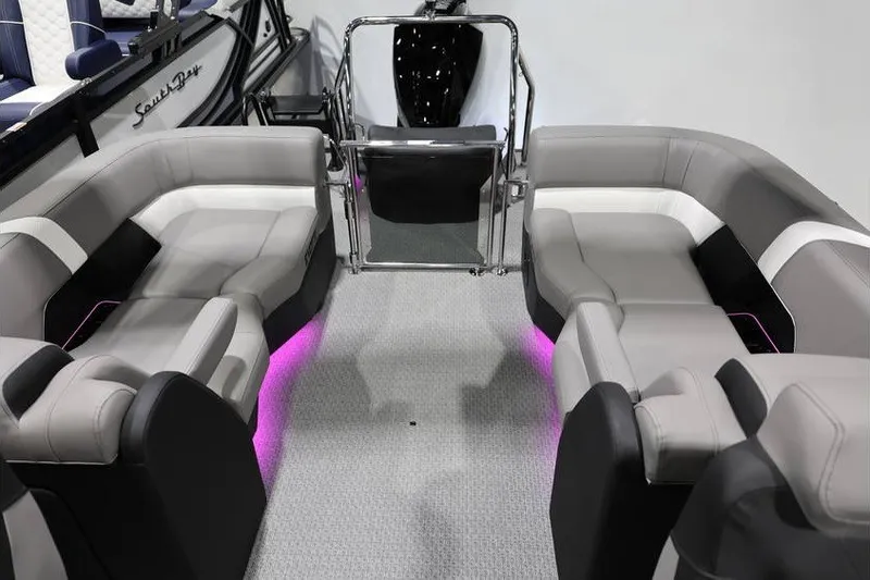 Slide: The Image of Luxurious 2026 Evotti 721QL boat interior with plush seating and ambient lighting. - 9