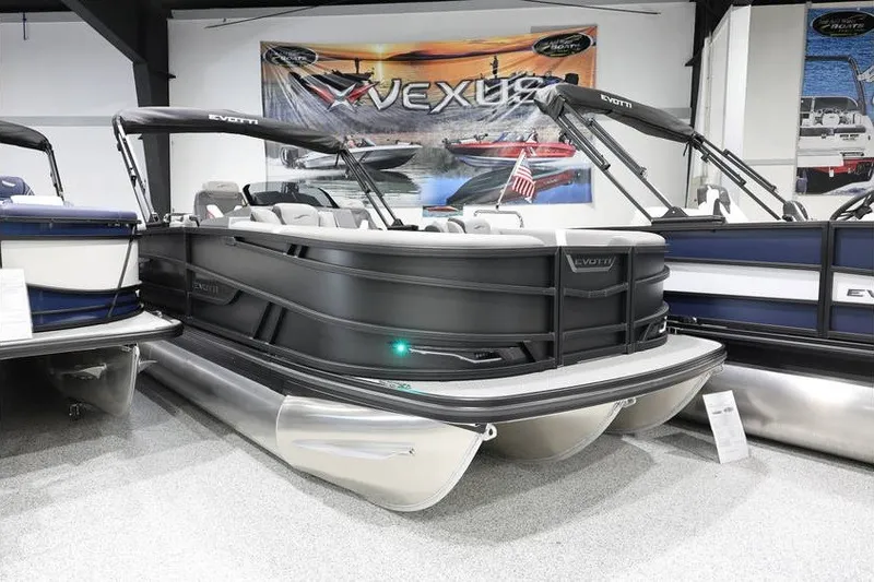 The Image of 2026 Evotti 721QL pontoon boat displayed in showroom with sleek design and modern features. - 1
