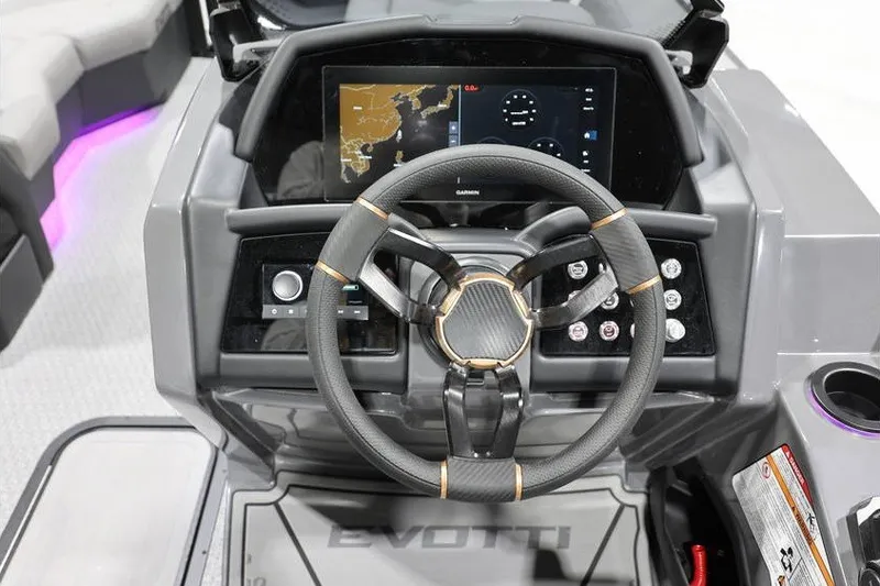 Slide: The Image of Steering console of 2026 Evotti 721QL boat with advanced navigation display. - 17