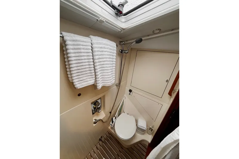 Slide: The Image of Bathroom interior of 1999 Oyster 53 Deck Saloon yacht with shower and toilet. - 5