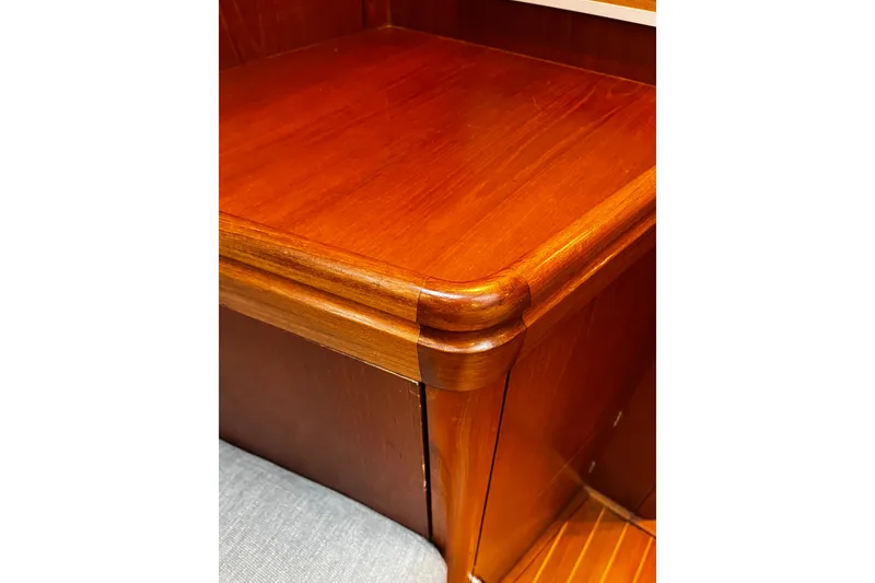 Slide: The Image of Polished wooden interior detail of a 1999 Oyster 53 Deck Saloon yacht. - 38