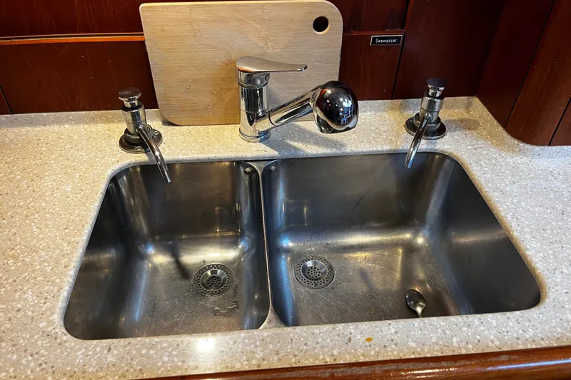 Slide: The Image of Stainless steel double sink in Oyster 53 Deck Saloon yacht kitchen, 1999 model. - 44