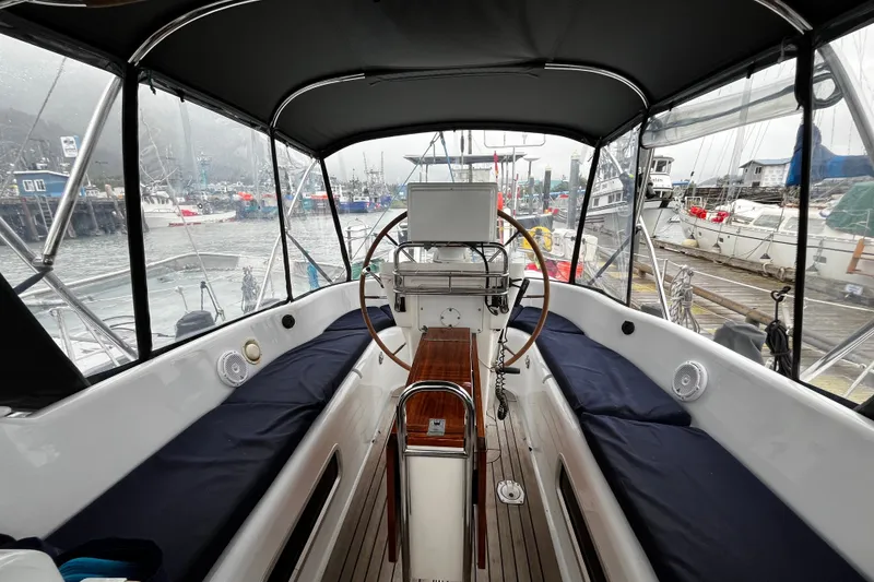 Slide: The Image of Cockpit view of 1999 Oyster 53 Deck Saloon yacht docked at marina. - 72