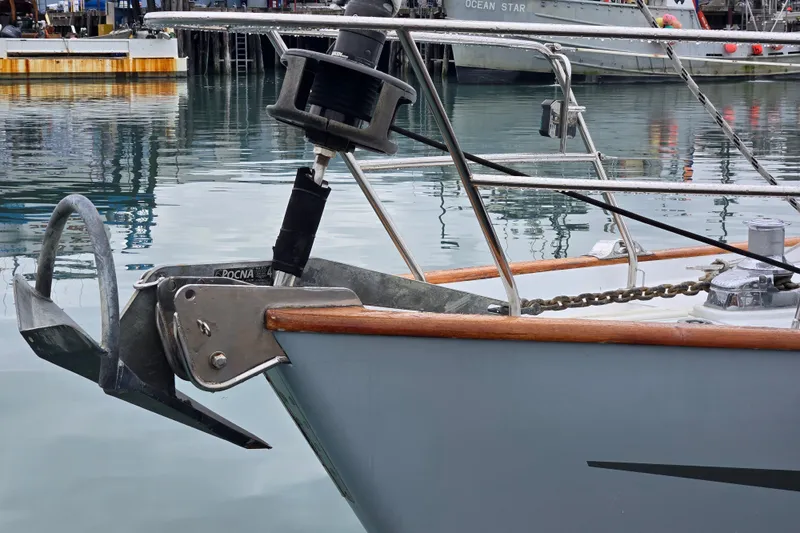 Slide: The Image of Close-up of 1999 Oyster 53 Deck Saloon yacht anchor and bow in harbor. - 64