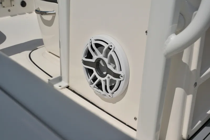 Slide: The Image of 2023 Robalo 246 Cayman boat speaker detail, featuring JL Audio marine speaker. - 24
