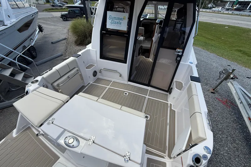 Slide: The Image of 2026 Solara S-250 C boat with spacious deck and modern seating arrangement. - 6