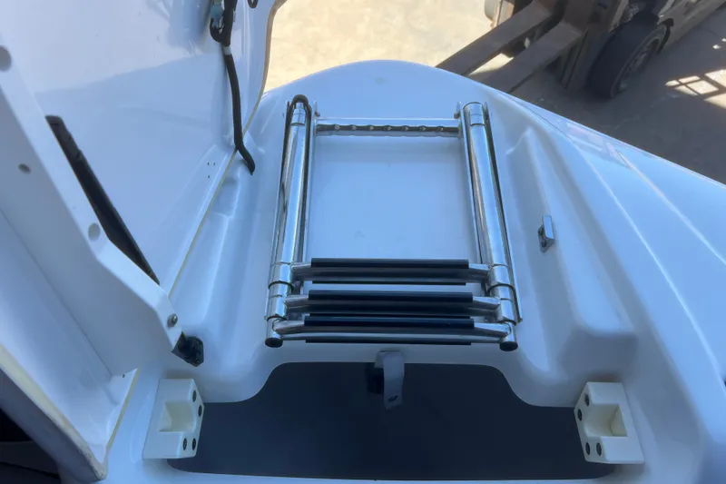 Slide: The Image of Foldable ladder on 2019 Yamaha Boats 212X, showcasing sleek design and functionality. - 23