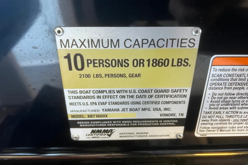 Slide: The Image of 2019 Yamaha Boats 212X capacity label, maximum 10 persons or 1860 lbs, safety compliance. - 25