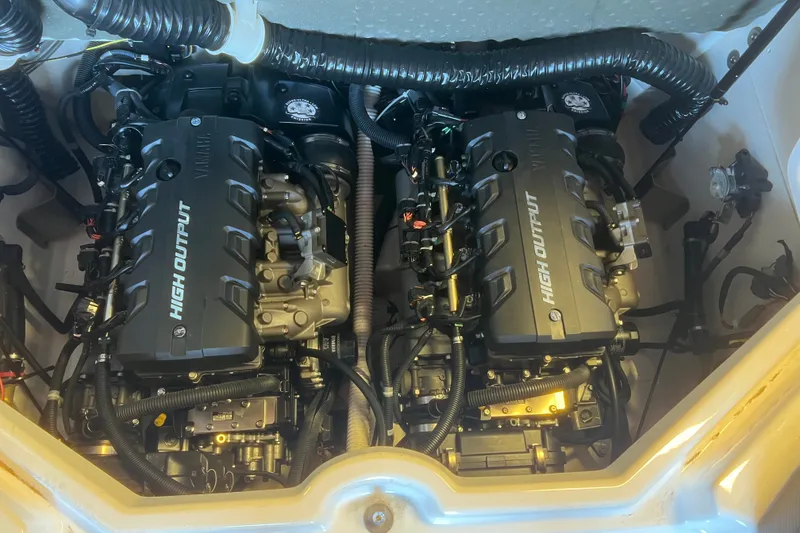 Slide: The Image of 2019 Yamaha Boats 212X high output engines in engine compartment. - 12