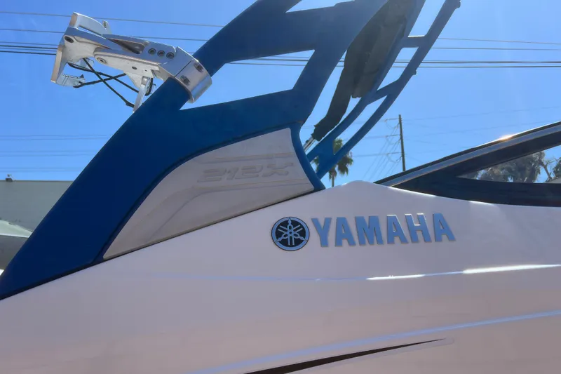 Slide: The Image of 2019 Yamaha Boats 212X, close-up of branding and design elements. - 21