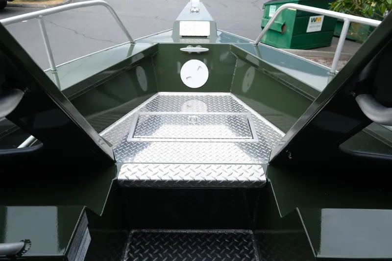 Slide: The Image of 2026 Hewescraft 240 Ocean Pro ET Hardtop bow with diamond plate flooring. - 15