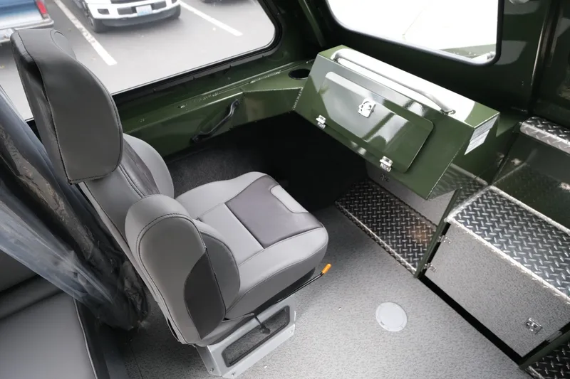 Slide: The Image of Interior of 2026 Hewescraft 240 Ocean Pro ET Hardtop with seating and storage. - 14