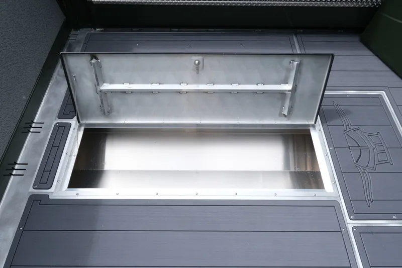 Slide: The Image of Open storage compartment on 2026 Hewescraft 240 Ocean Pro ET Hardtop boat deck. - 16