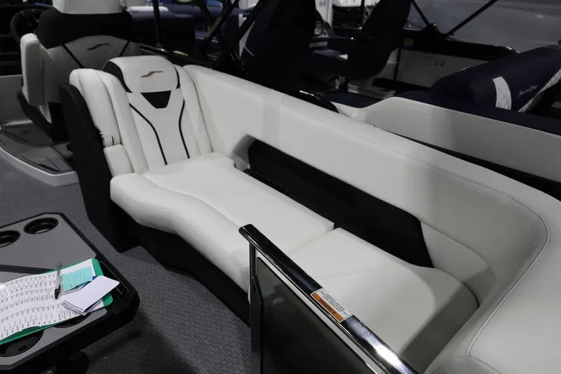 Slide: The Image of Luxurious interior of 2026 Evotti 723QL boat with sleek white seating. - 23