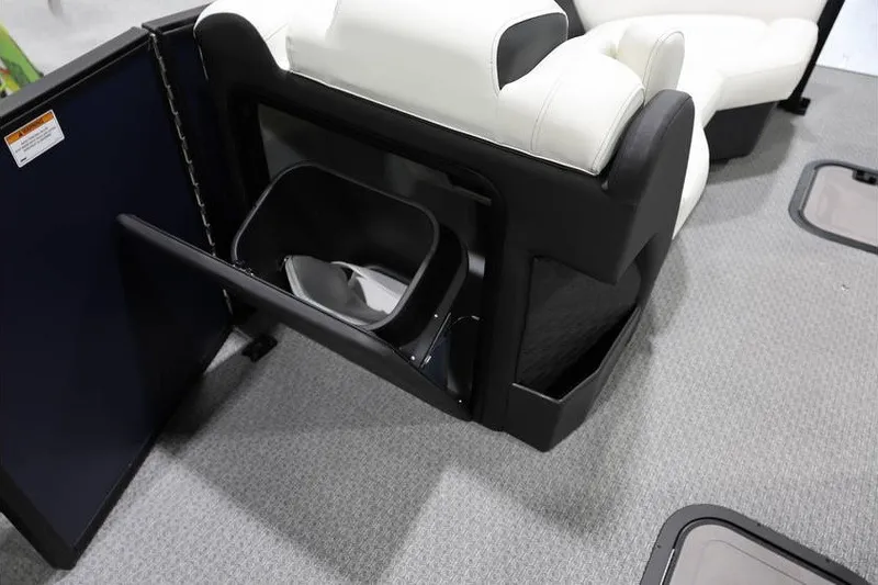 Slide: The Image of Evotti 723QL 2026 model with integrated storage and seating on carpeted floor. - 16