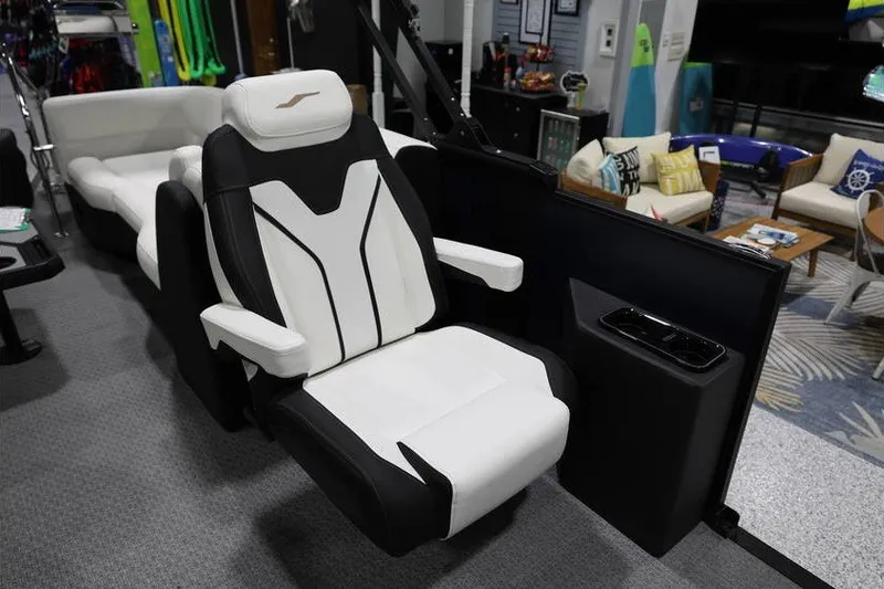 Slide: The Image of Luxury seating in a 2026 Evotti 723QL boat, featuring sleek black and white design. - 20