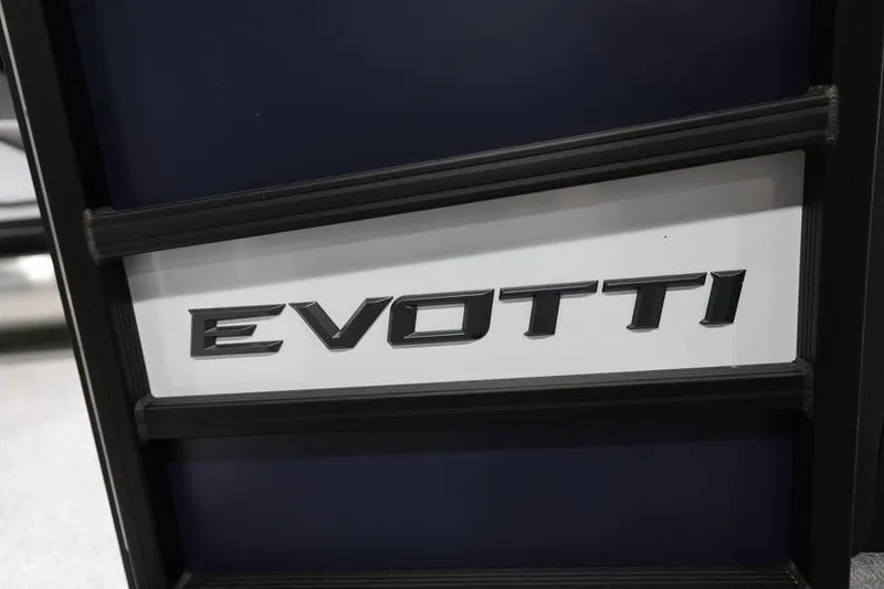 Slide: The Image of Close-up of 2026 Evotti 723QL logo on a vehicle grille. - 15