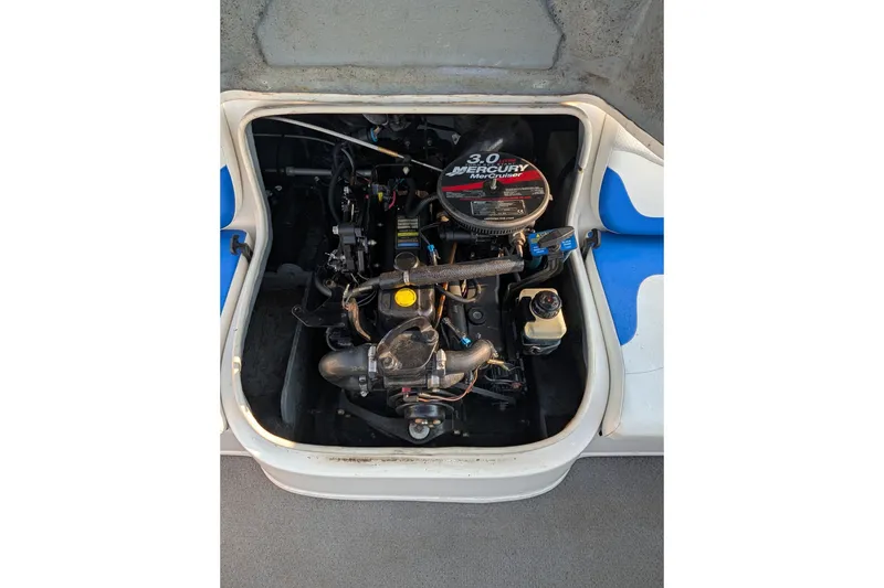 Slide: The Image of 2007 Bayliner 175 Bowrider engine compartment with 3.0L Mercury MerCruiser engine. - 18