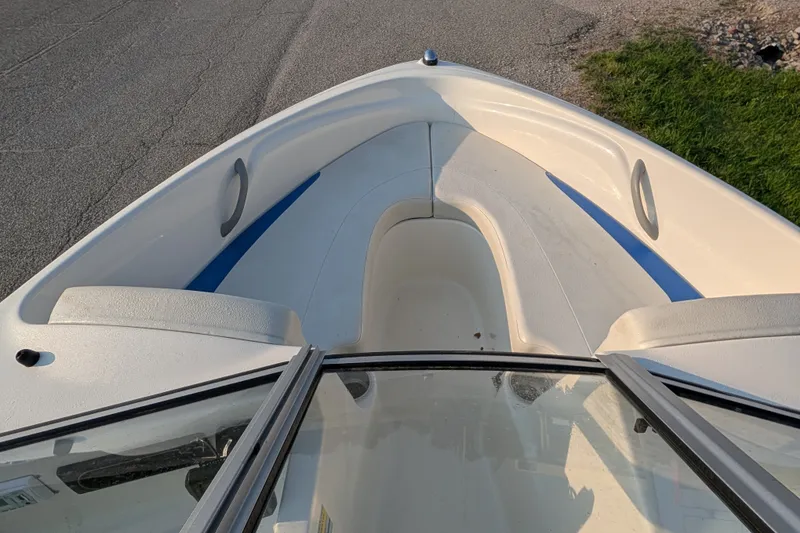 Slide: The Image of 2007 Bayliner 175 Bowrider boat interior with seating and windshield view. - 16