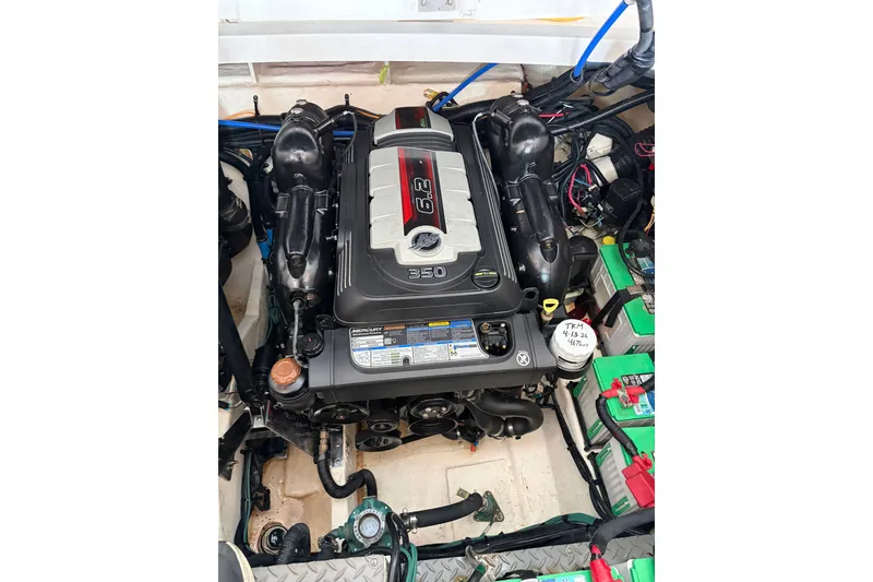 Slide: The Image of Engine compartment of a 2020 Sea Ray Sundancer 320 with a 6.2L engine. - 13