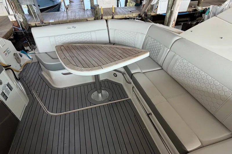 Slide: The Image of Luxurious seating area on 2020 Sea Ray Sundancer 320 yacht with wooden table. - 4