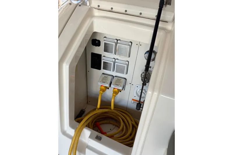 Slide: The Image of Electrical panel with yellow cables on a 2020 Sea Ray Sundancer 320 boat. - 15