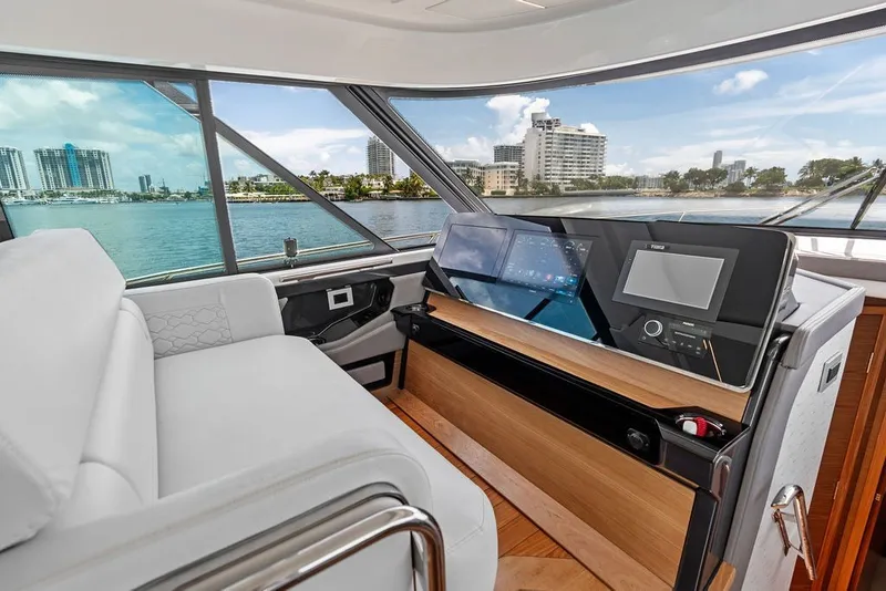 Slide: The Image of Interior view of 2024 Tiara 48 LE yacht with modern navigation system. - 43