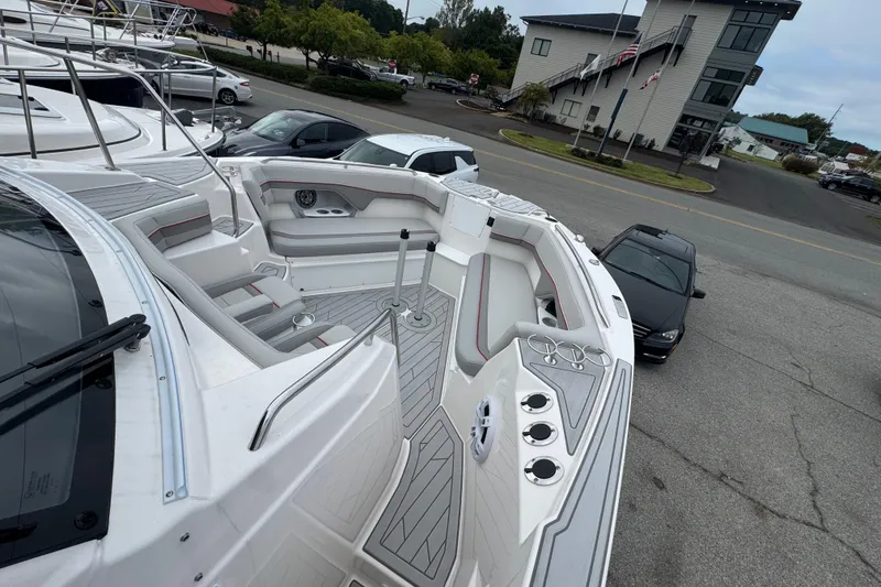Slide: The Image of 2026 Solara S-310 CW boat with spacious seating and modern design at a marina. - 25