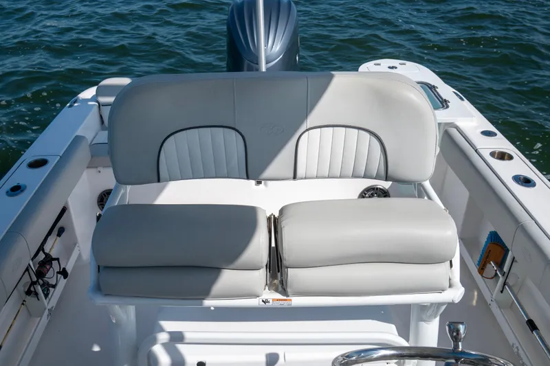 Slide: The Image of 2022 Sea Fox 248 Commander boat seating with ocean backdrop. - 5