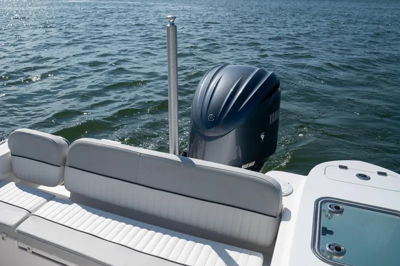 Slide: The Image of 2022 Sea Fox 248 Commander boat with Yamaha outboard motor on open water. - 12