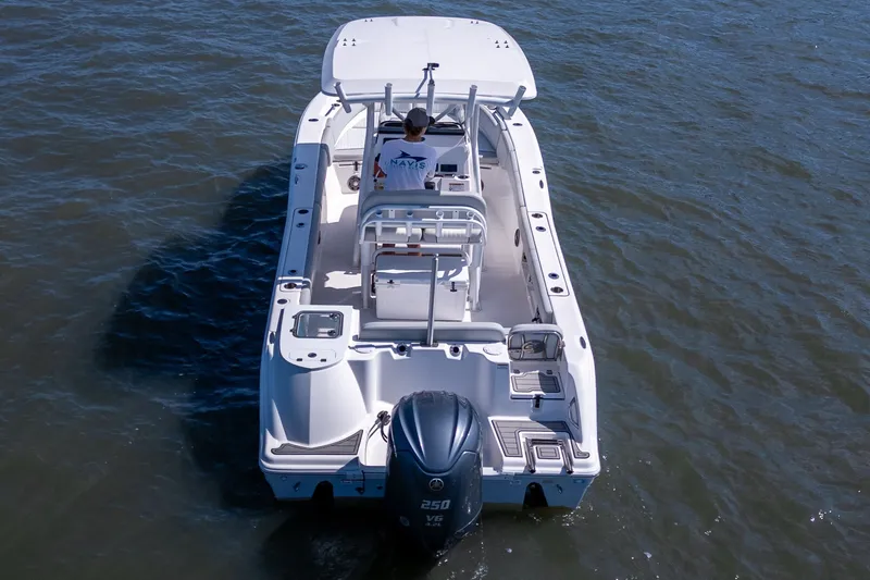 Slide: The Image of 2022 Sea Fox 248 Commander boat on water, rear view with outboard motor. - 15