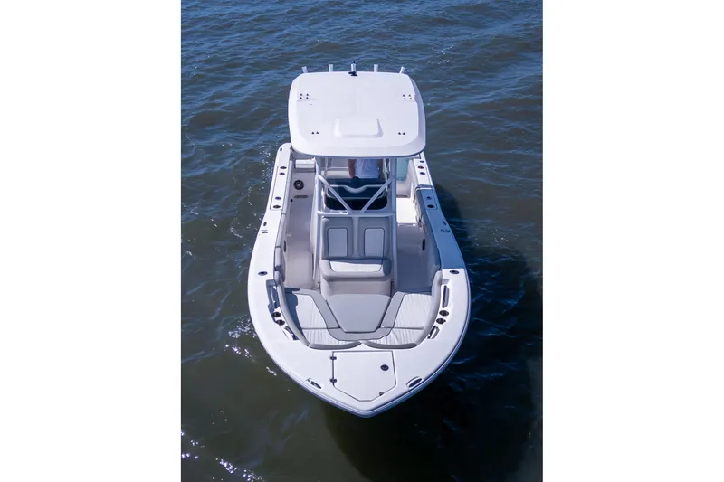 Slide: The Image of 2022 Sea Fox 248 Commander boat on water, aerial view showcasing sleek design. - 17