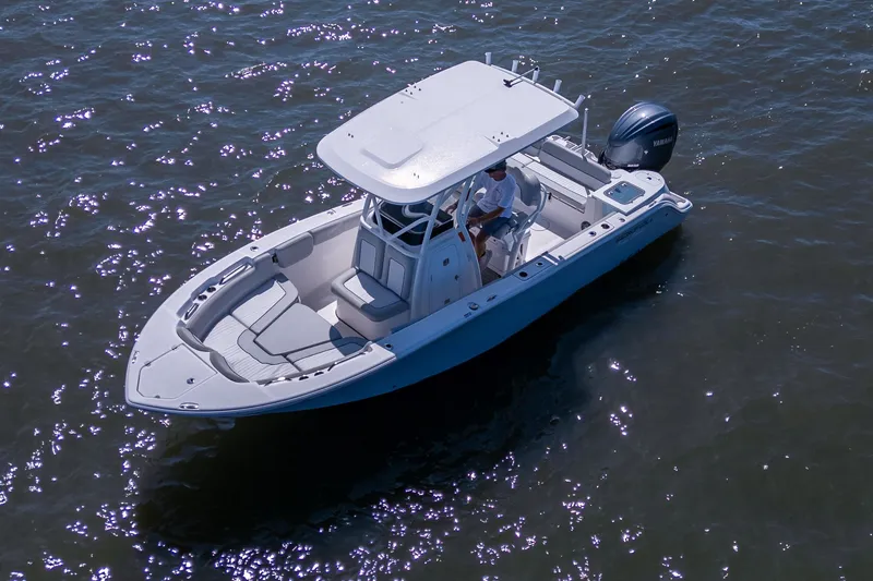 Slide: The Image of 2022 Sea Fox 248 Commander boat on water, featuring sleek design and spacious seating. - 3