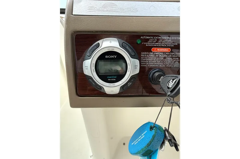 Slide: The Image of Sony marine stereo system on 2012 Sea Ray 260 Sundeck dashboard. - 32