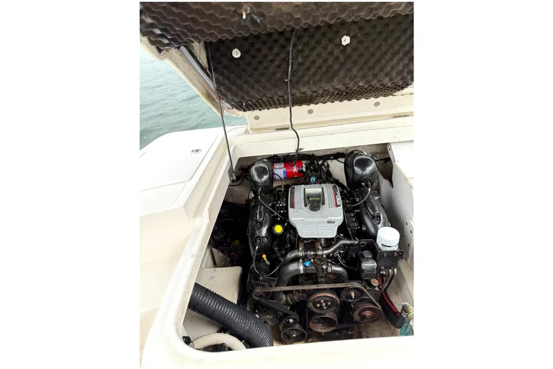 Slide: The Image of Engine compartment of a 2012 Sea Ray 260 Sundeck boat. - 25