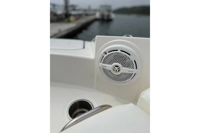 Slide: The Image of Speaker and cup holder on 2012 Sea Ray 260 Sundeck boat. - 29