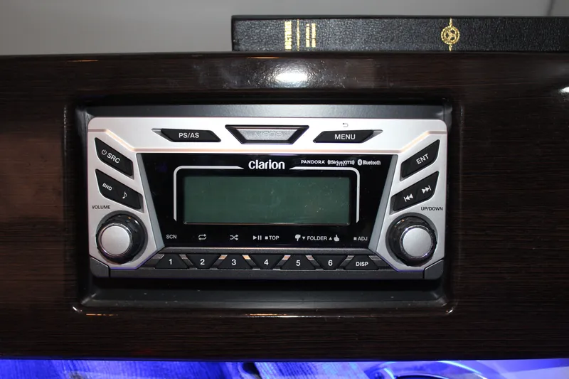 Slide: The Image of Clarion stereo system in 2017 Formula 330 Crossover Bowrider, featuring Bluetooth and SiriusXM capabilities. - 43