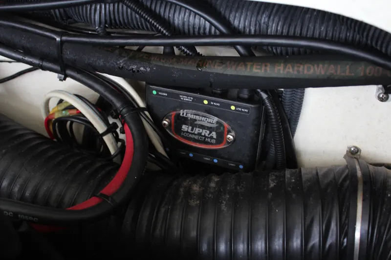 Slide: The Image of Engine compartment of 2017 Formula 330 Crossover Bowrider with Lumishore Supra i-Connect Hub. - 33