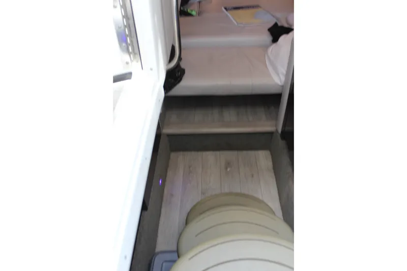 Slide: The Image of Interior view of 2017 Formula 330 Crossover Bowrider cabin with seating and flooring. - 38