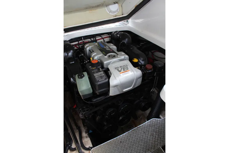 Slide: The Image of Engine compartment of a 2017 Formula 330 Crossover Bowrider boat. - 35