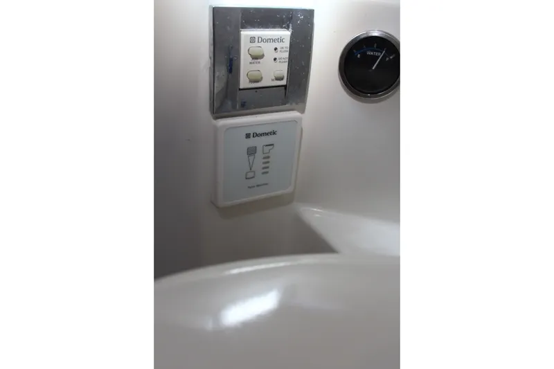 Slide: The Image of Control panel and gauge on 2017 Formula 330 Crossover Bowrider boat. - 42