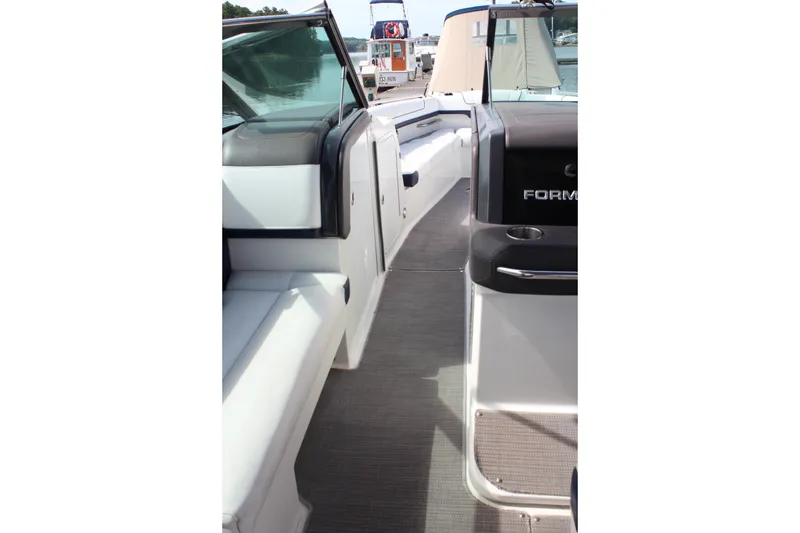 Slide: The Image of 2017 Formula 330 Crossover Bowrider interior with sleek seating and modern design. - 16