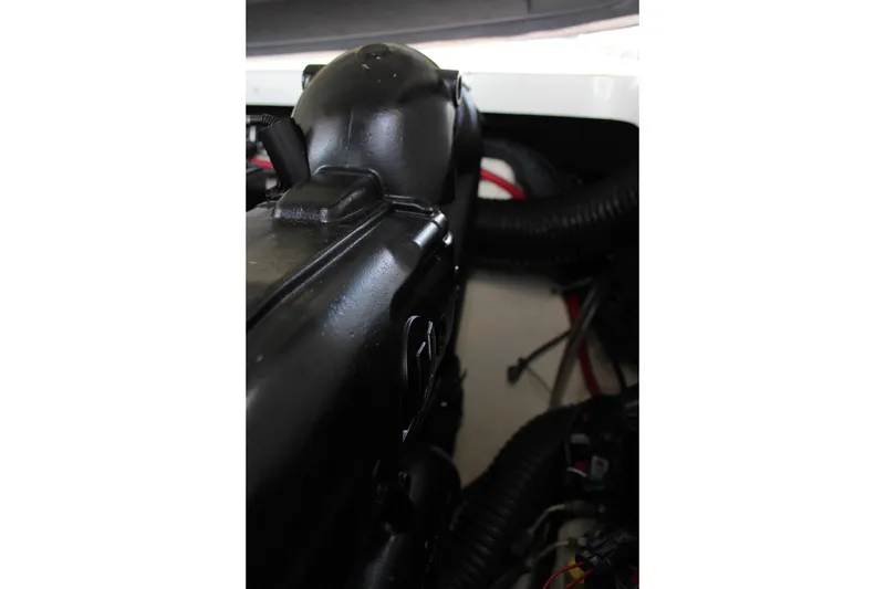 Slide: The Image of Engine compartment of a 2017 Formula 330 Crossover Bowrider boat. - 34