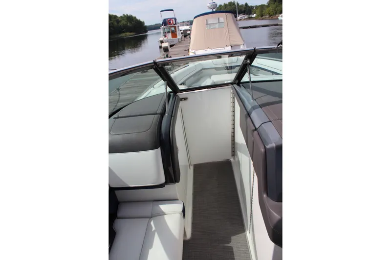 Slide: The Image of 2017 Formula 330 Crossover Bowrider interior view at dockside. - 14