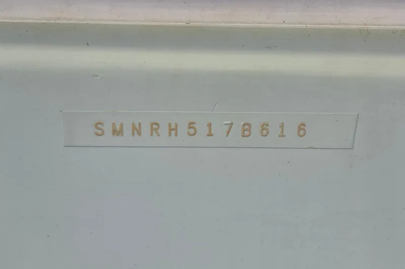 Slide: The Image of Hull identification number on 2016 Sportsman Heritage 211 Center Console boat. - 17