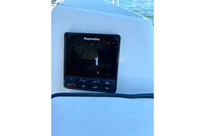 Slide: The Image of Raymarine navigation display on a 1996 Freedom 35 sailboat, with water in the background. - 20